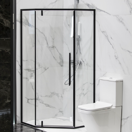 The image displays a modern bathroom interior in Fort Mill featuring a black grid glass shower with a loft partition made of black metal cage and glass. The shower has a minimalist and modern design, with clean lines and a simple color palette. The black grid glass creates a striking contrast against the white walls and fixtures, adding a bold and dramatic touch to the space. The loft partition provides a sense of openness and transparency, creating a spacious and airy feel